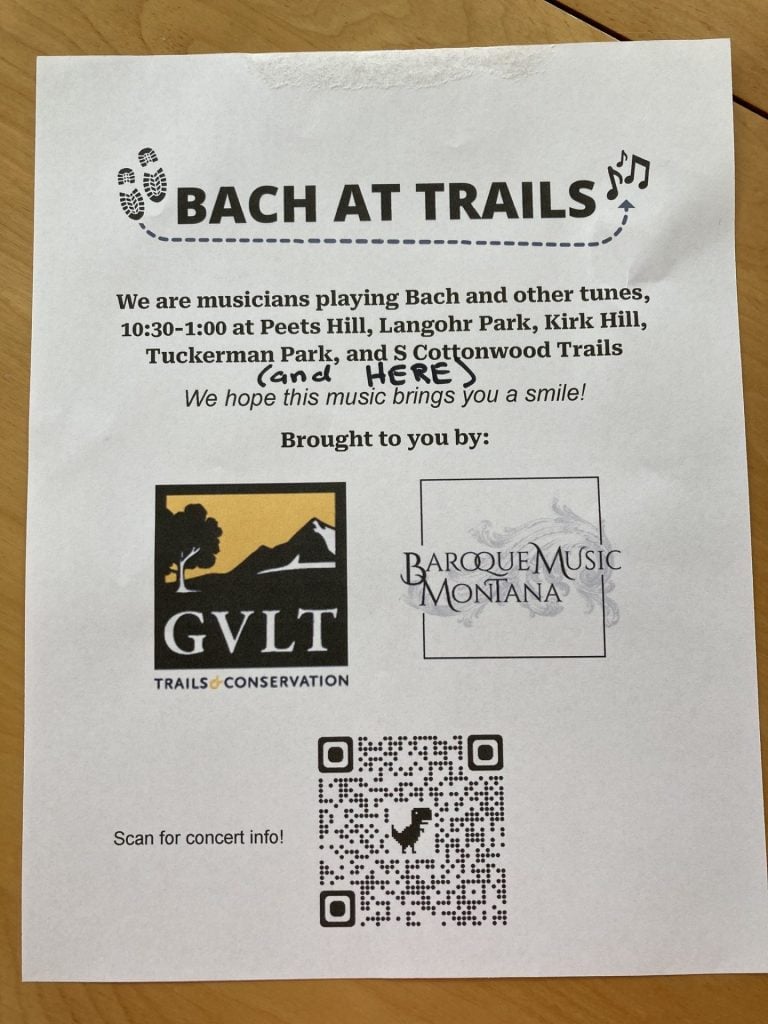 Flyer for "Bach at Trails" announcing musicians playing at local parks and trails, featuring GVLT and Baroque Music Montana logos, a QR code, and event details.