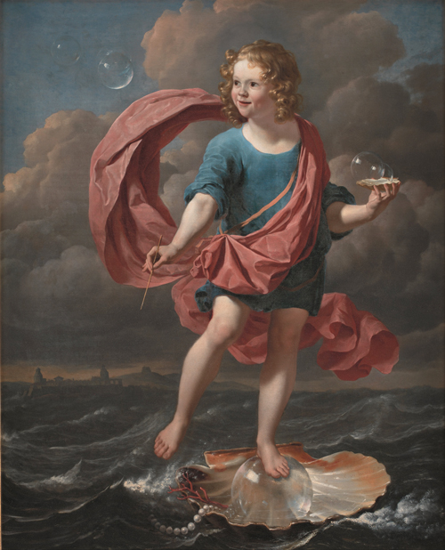 boy blowing soap bubbles